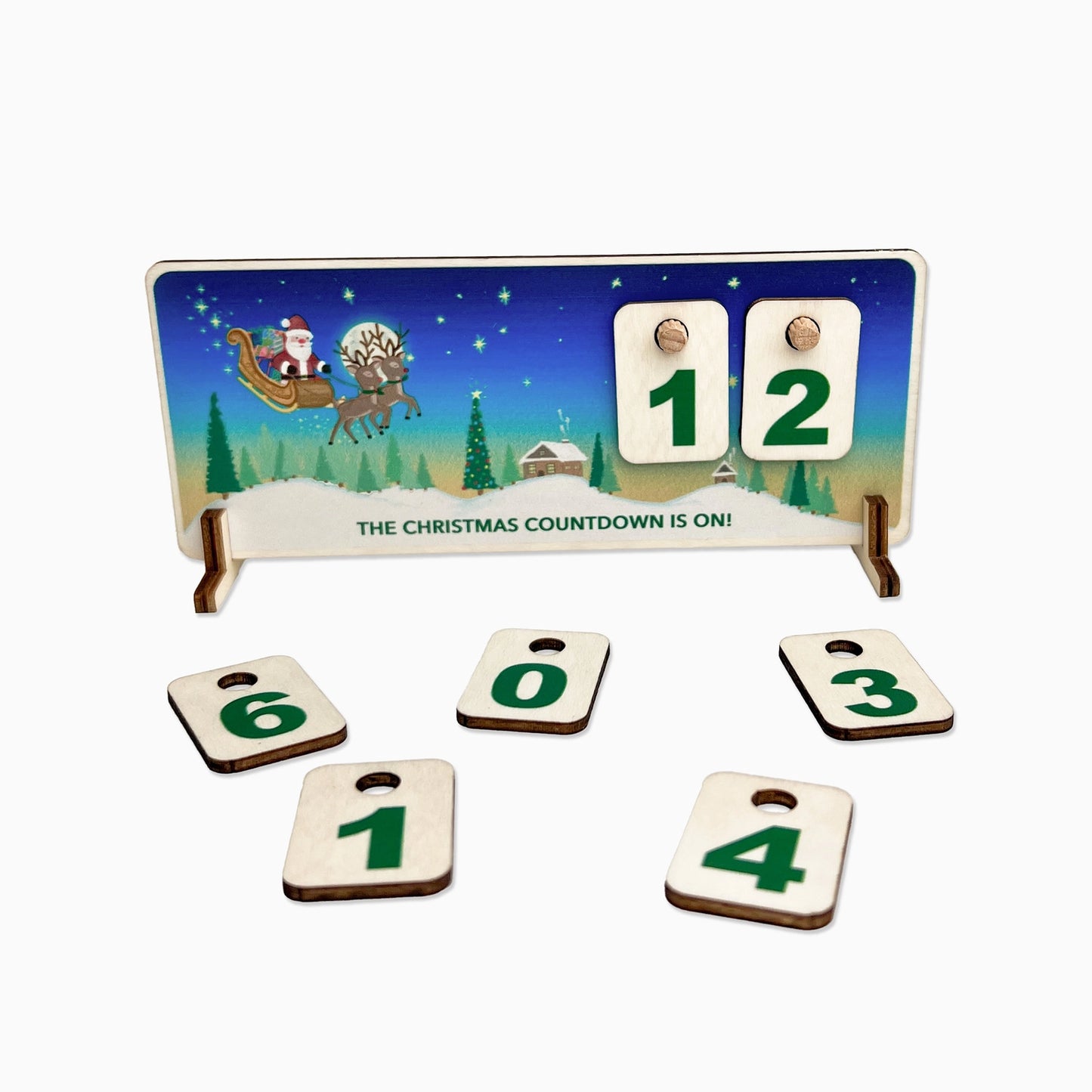 Christmas countdown calendar with Santa and reindeer illustration on a stand.