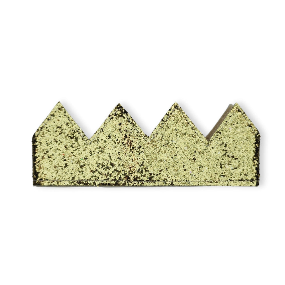 Gold glittery crown on a white background