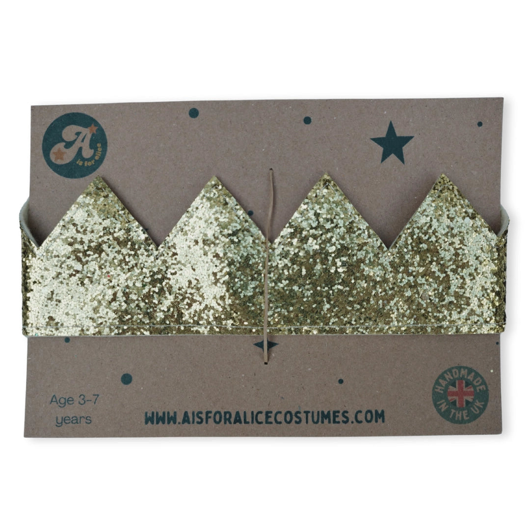 Gold glitter tiara crown on a cardboard backing with branding and website information.