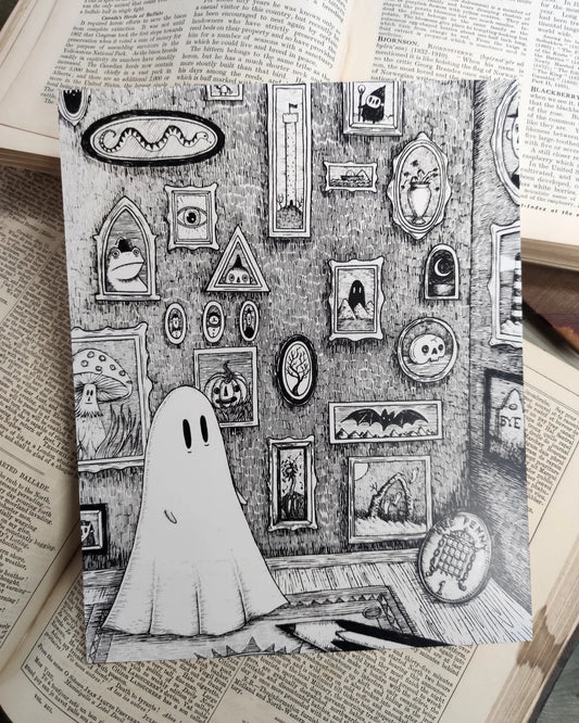 Black and white illustration of a ghost admiring his room of curiosities, with a wall filled with spooky framed pictures.