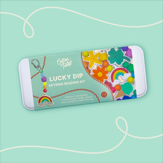 Cotton Twist Lucky Dip keyring beading kit on a light blue background