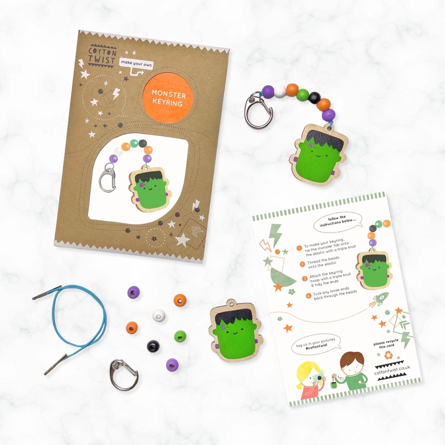 Monster keyring craft kit with materials and instructions on a white background