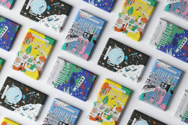 Otherly Chocolate bars in a flatlay display, including the full range of flavours & exciting packaging design.