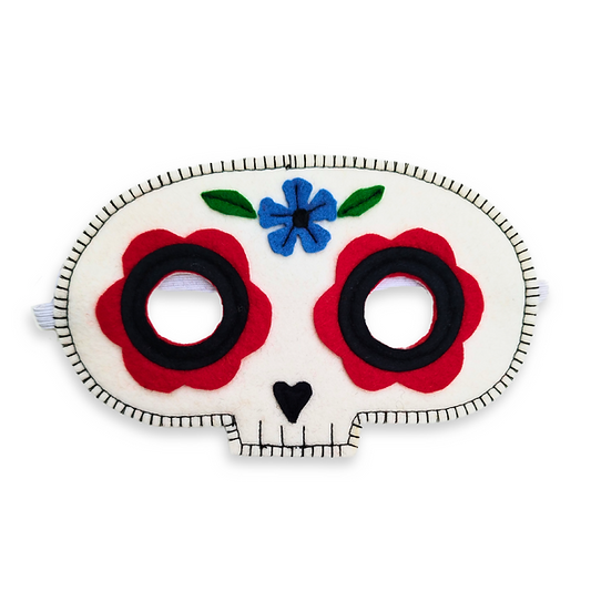 Decorative sugar skull themed eye mask with floral designs on a white background