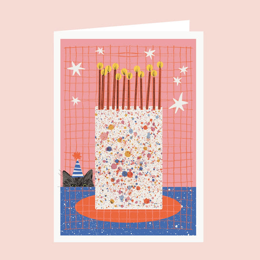 Giant colourful birthday cake sat on a table with a cat in a party hat. Illustrated design on a pink background.