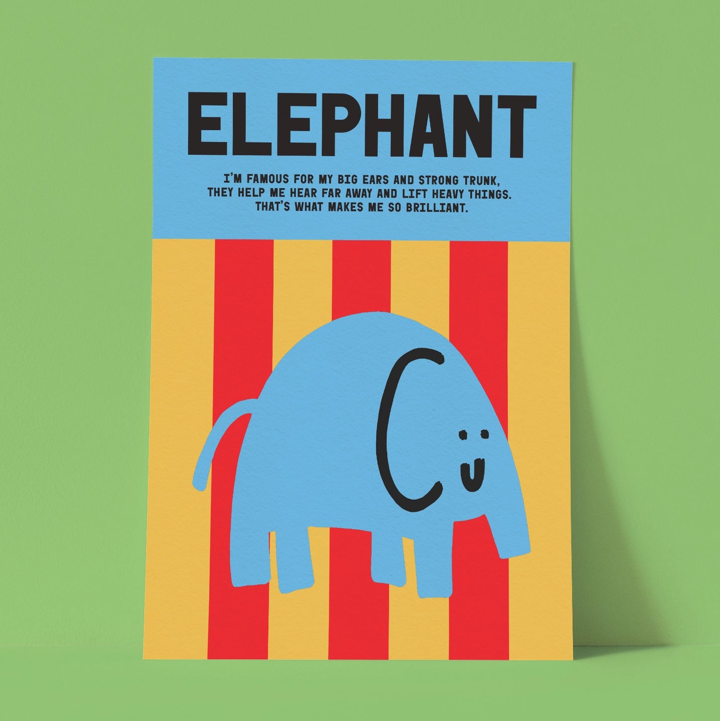 Illustrated blue elephant print on a yellow and red striped background. Against a green backdrop.