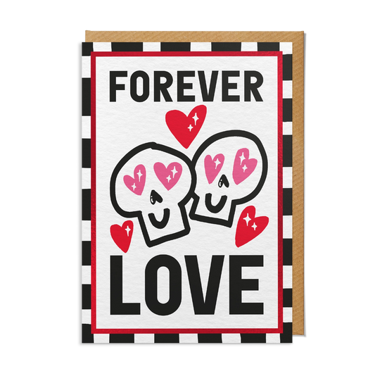 Card with cartoon skulls and hearts and text 'Forever Love' on a checkered background.