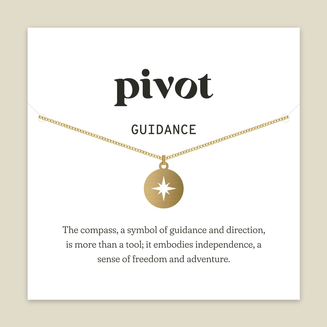A bronze compass pendant necklace on a delicate chain, presented on a white display card with the brand name 'pivot' and the word 'GUIDANCE' printed above it, set against a warm beige background.