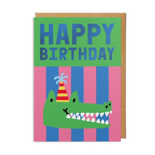 Birthday card with a crocodile wearing a party hat on a striped background.