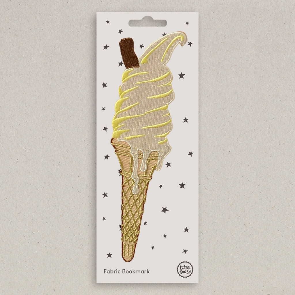 Fabric bookmark shaped like an ice cream cone on a white card with star patterns.