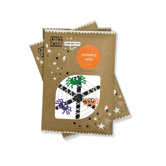 Children's craft kit packaging with spider design on a white background