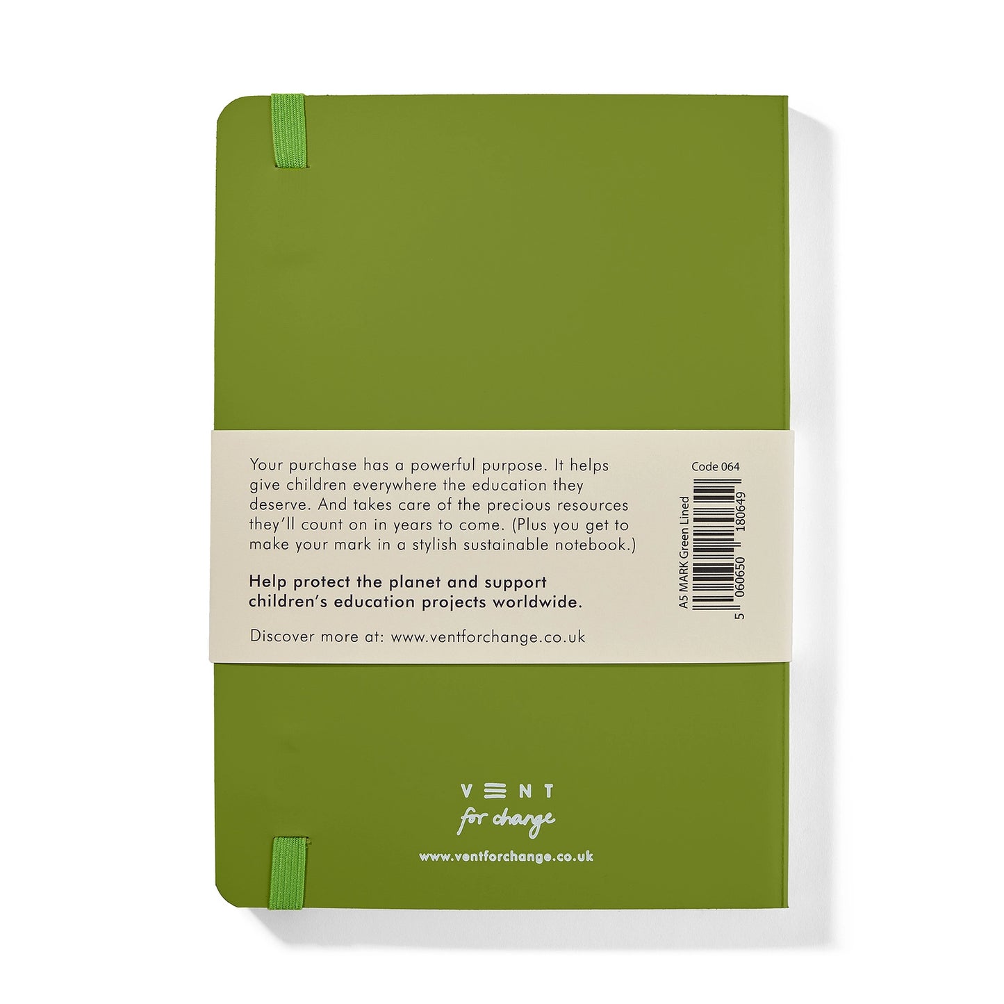 Green notebook with a label on the back, featuring text and branding.