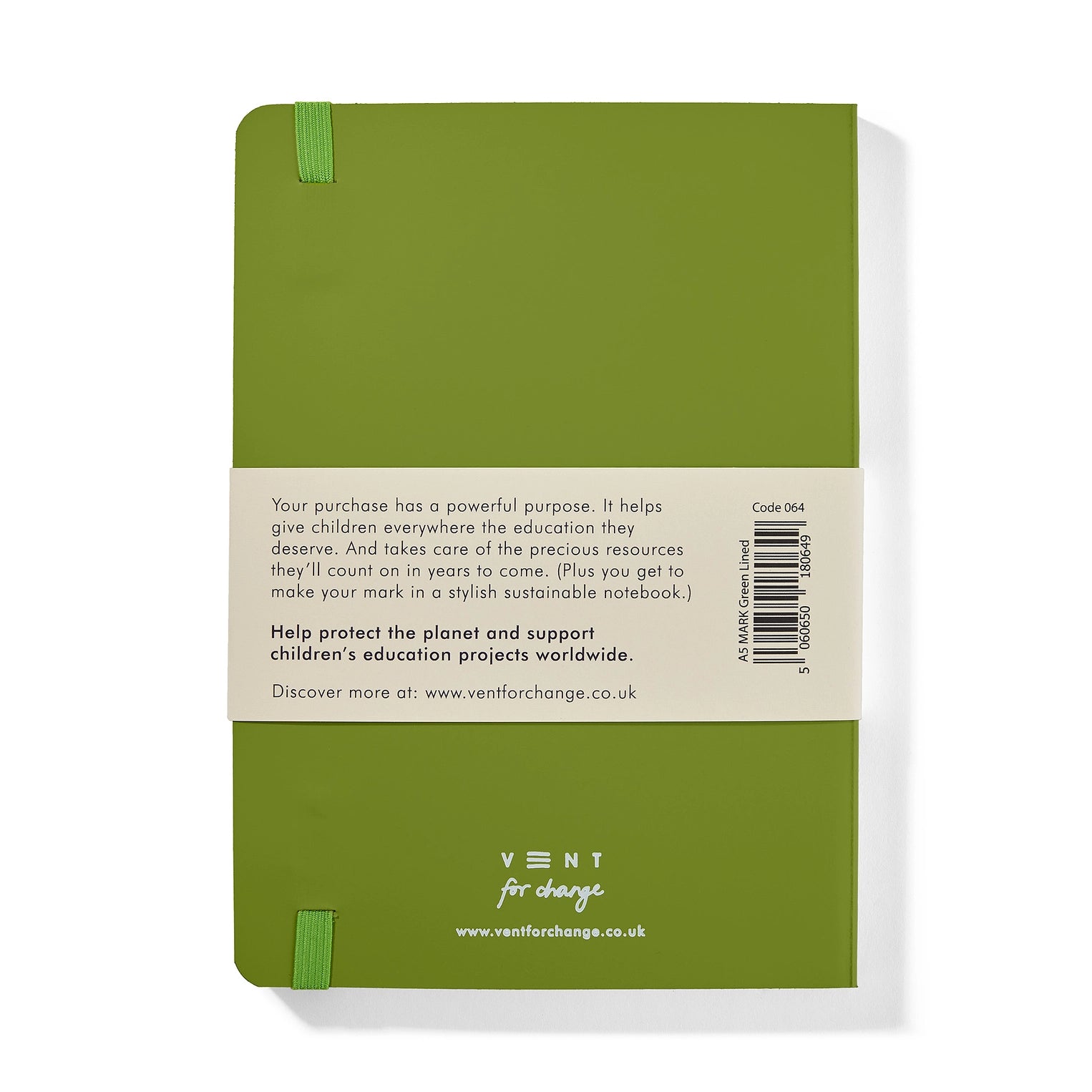 Green notebook with a label on the back, featuring text and branding.
