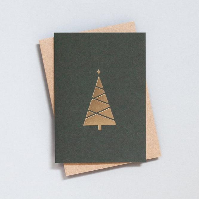 Brass foiled christmas tree motif on dark green card with kraft envelope.